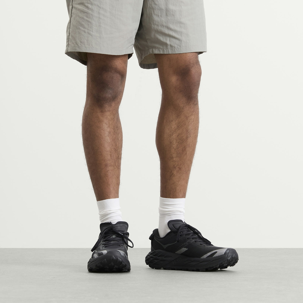 HOKA ONE ONE Men's Speedgoat 7 Sneaker in Black/Outer Orbit