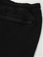 Stone Island - Tapered Logo-Appliquéd Garment-Dyed Cotton-Jersey Sweatpants - Black