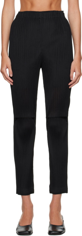 Photo: ISSEY MIYAKE Black Sheer Split Pleats Trousers
