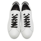 Common Projects White and Black Retro Low Glossy Sneakers