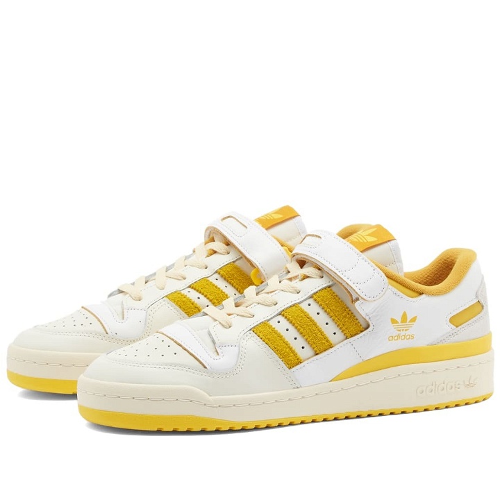Photo: Adidas Forum 84 Low Sneakers in White/Hazy Yellow