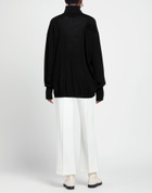 Quira Womens Turtleneck in Black