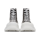 Alexander McQueen Black and White Leather Tread Slick Boots