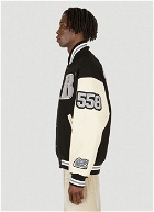 Gallery and Gift Shop Roots® Varsity Jacket in Black
