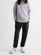 Museum Of Peace & Quiet - Tapered Logo-Print Cotton-Jersey Sweatpants - Black