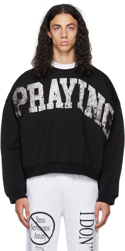 Photo: Praying Black Faded Sweatshirt