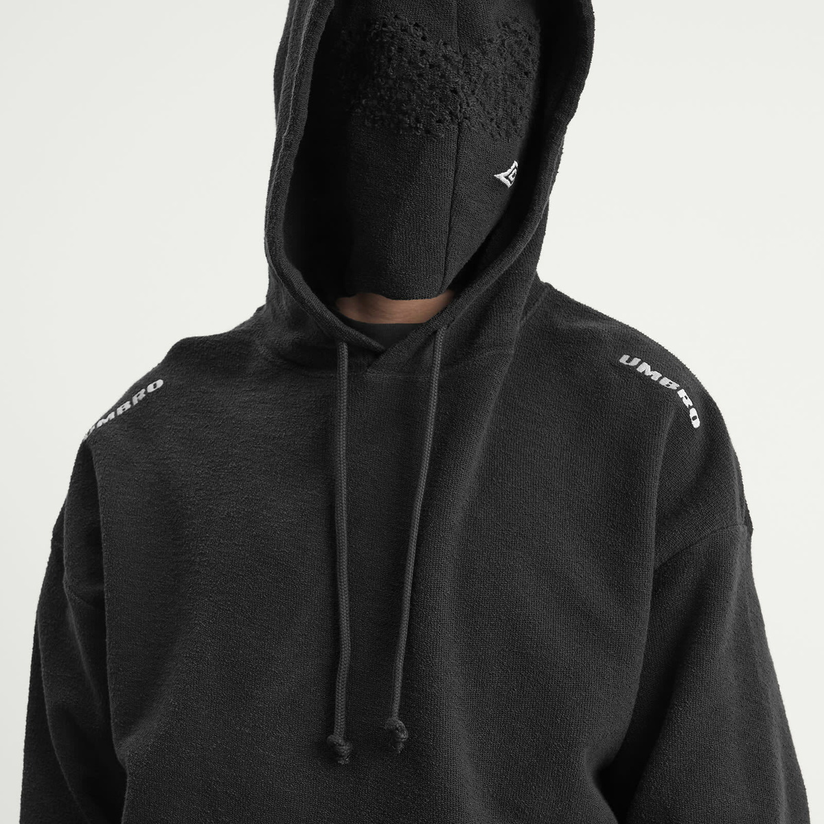 Umbro by Slam Jam Men's Lasered Masked Hoodie in Washed Black