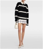JW Anderson Striped wool-blend polo sweater
