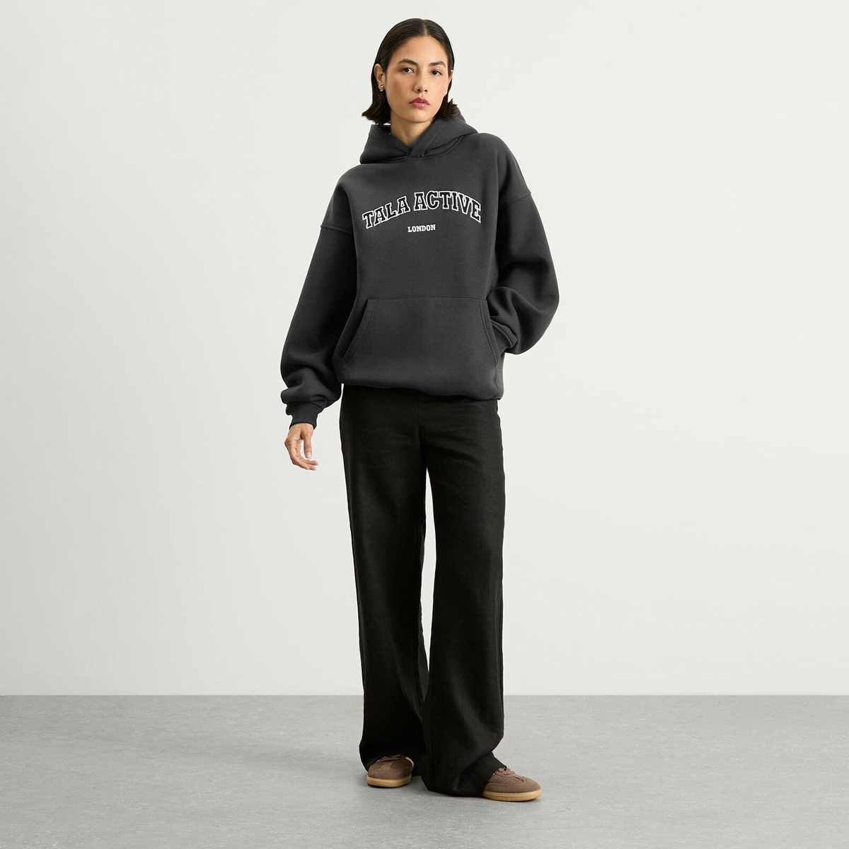 TALA Women's Oversized Active Logo Hooded Sweatshirt in Vintage Black
