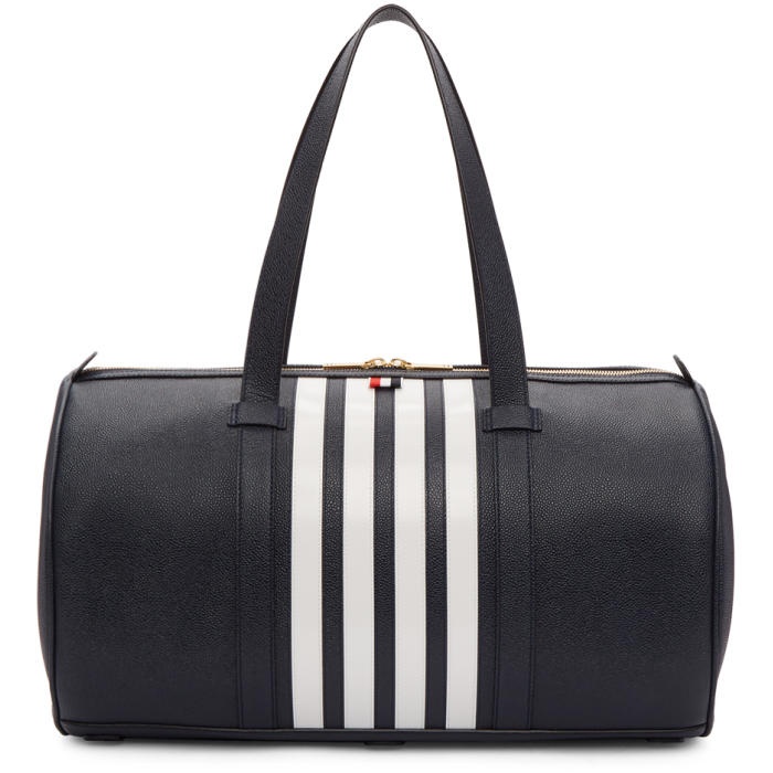 Photo: Thom Browne Navy Unstructured Four Bar Gym Bag