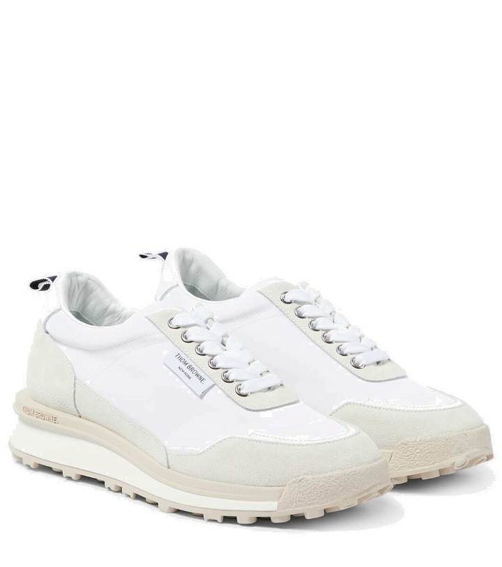 Photo: Thom Browne Alumni Trainer suede-trimmed sneakers