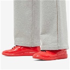 Maison Margiela Men's Replica Rubberised Leather Sneakers in High Risk Red