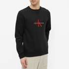 Calvin Klein Men's Archival Monogram Flock Crew Sweat in Black