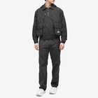 And Wander Men's Water Repellant Light Popover Jacket in Black