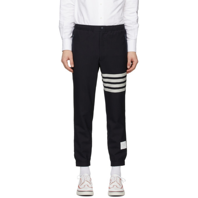 Photo: Thom Browne Navy Snap Front Track Trousers
