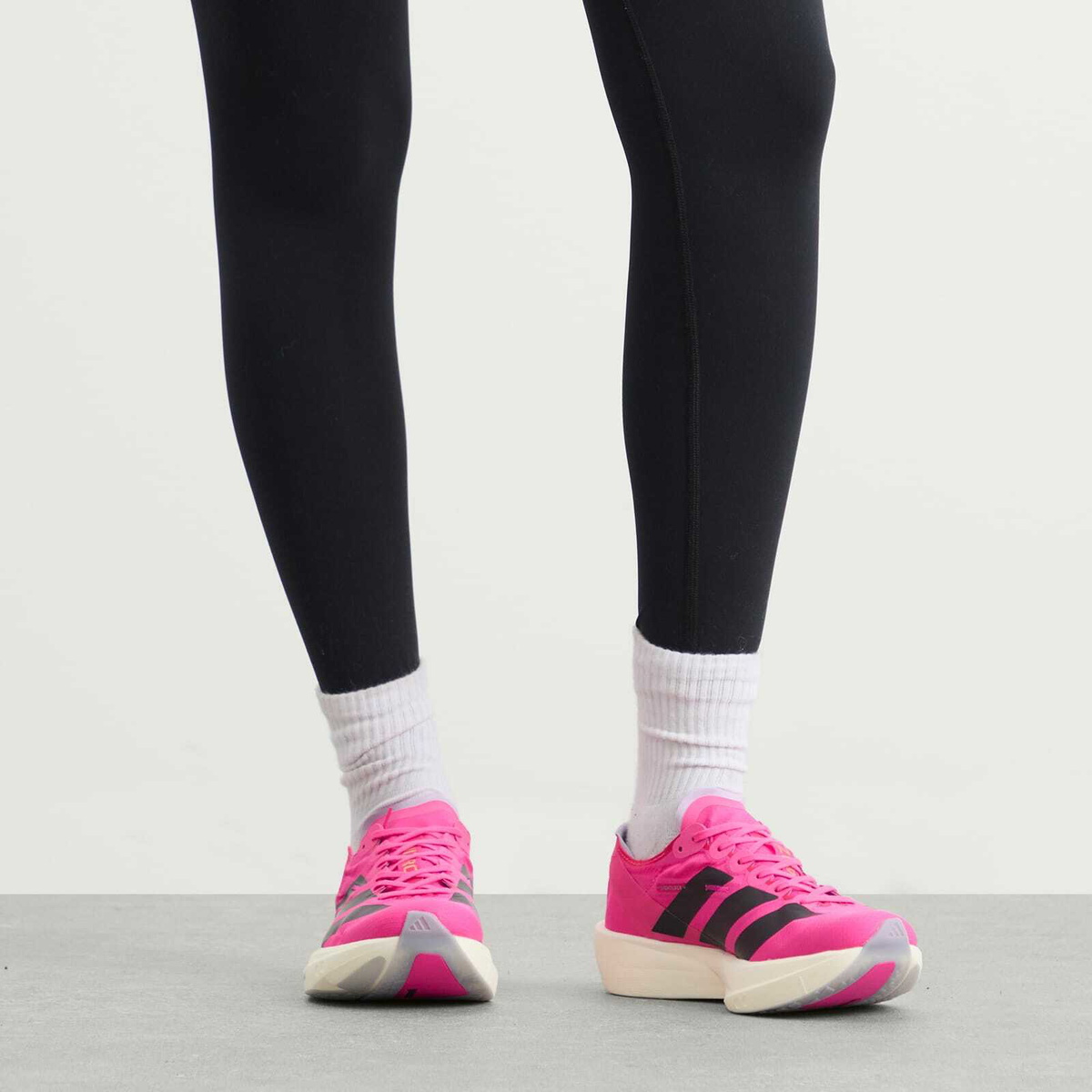 Adidas Adizero Takumi Sen 11 Sneaker in Shock Pink/Aurora Black/Powder Plum