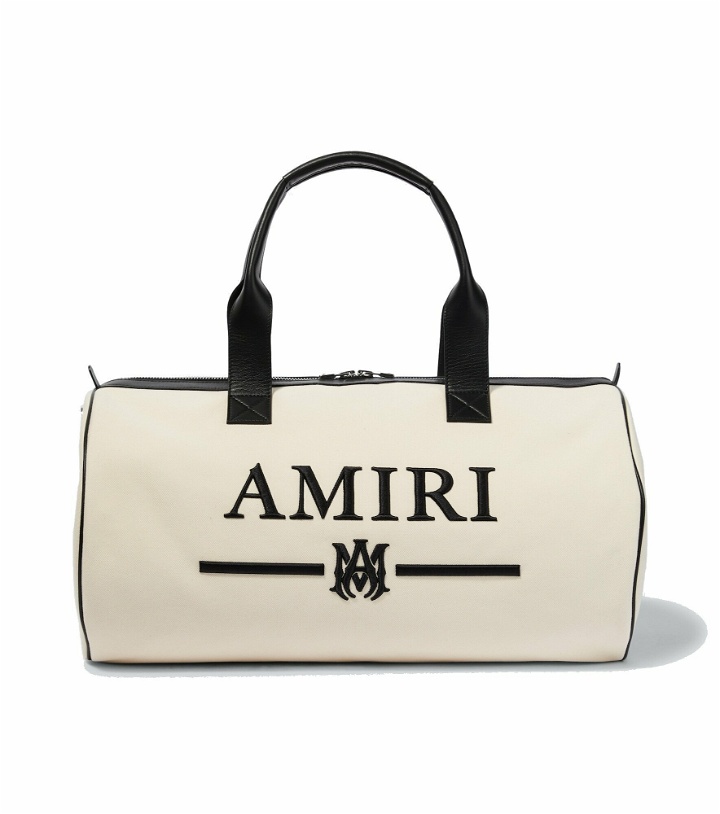Photo: Amiri - Logo canvas duffel bag
