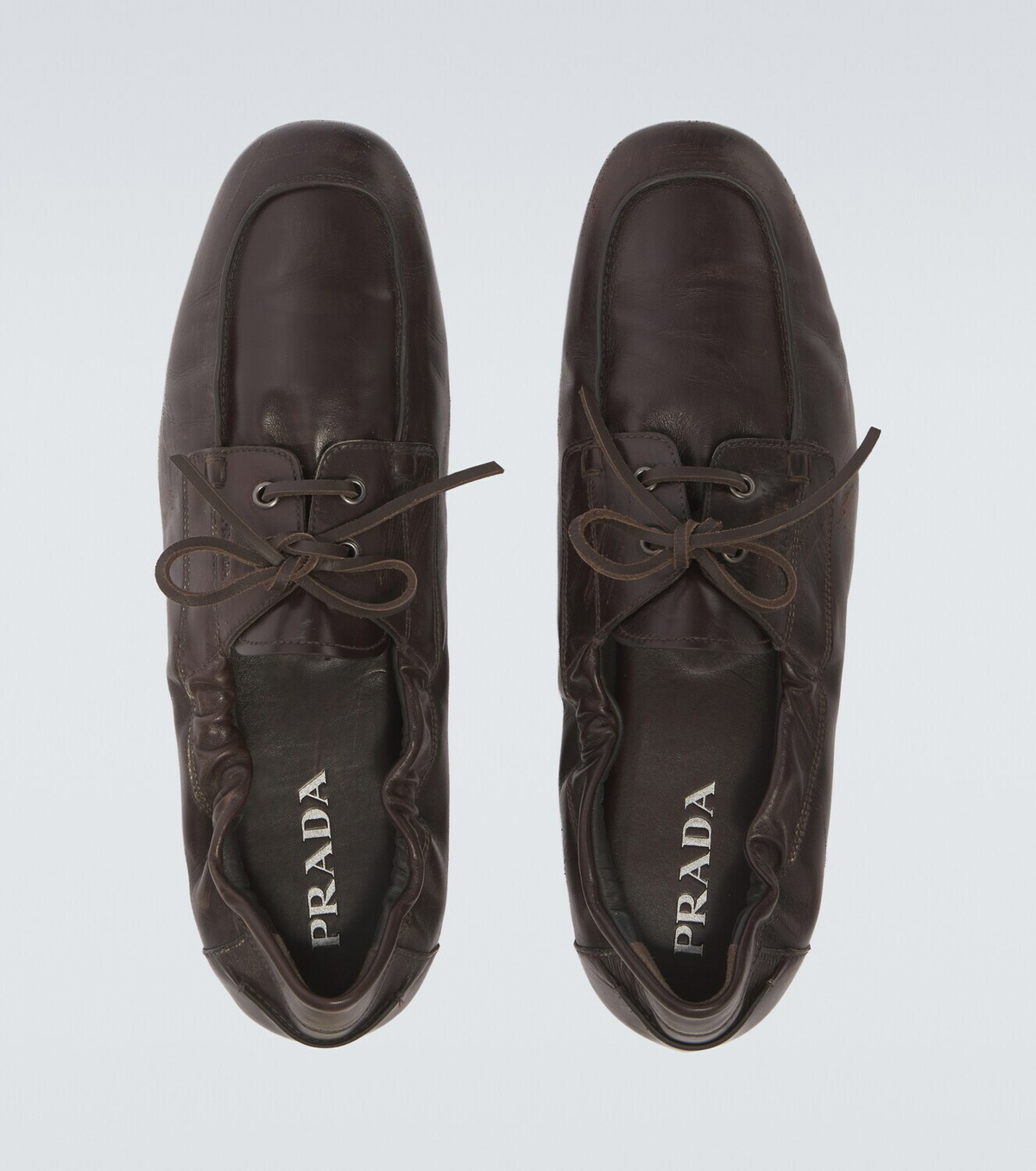 Prada Shuffle leather boat shoes