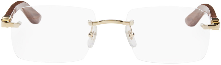 Photo: Cartier Gold & Brown Rimless Glasses