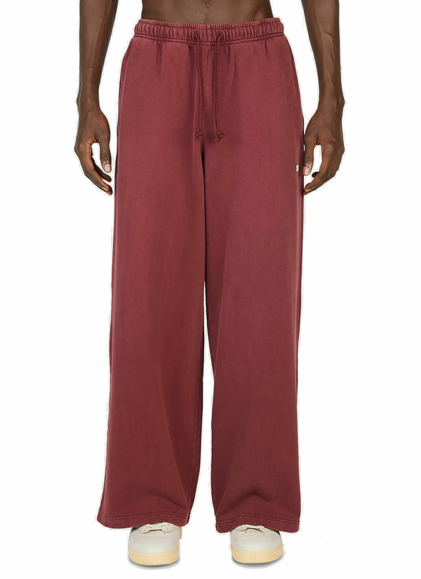 Photo: Acne Studios - Fleece Track Pants in Red