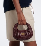 Miu Miu Wander Mini matelassé leather top-handle bag