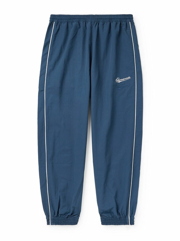 Photo: Willy Chavarria - Bad Boy Tapered Logo-Embroidered Piped Shell Trackpants - Blue