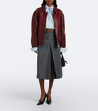 Prada Distressed houndstooth leather jacket