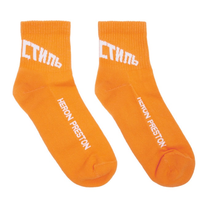 Photo: Heron Preston Orange and White Logo Socks