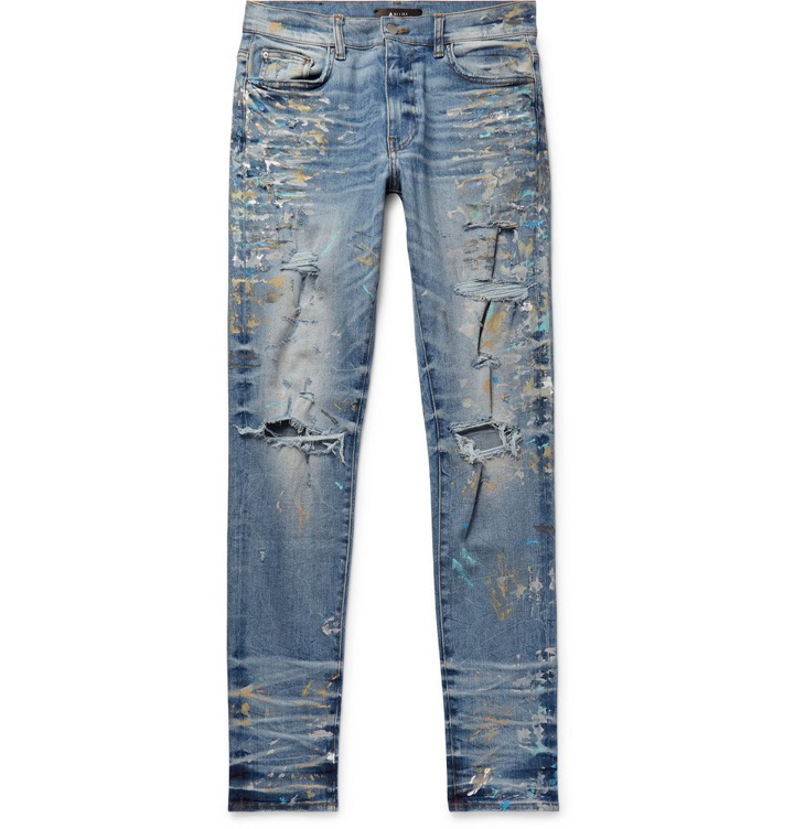 Photo: AMIRI - Skinny-Fit Distressed Paint-Splattered Stretch-Denim Jeans - Light blue