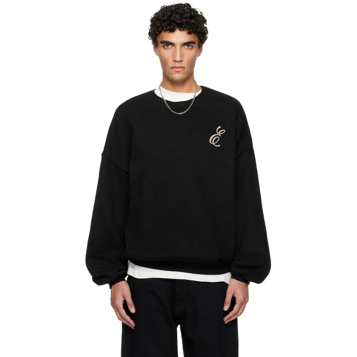 Photo: Fear of God ESSENTIALS Black Holiday Embroidered Merino Crewneck Sweater