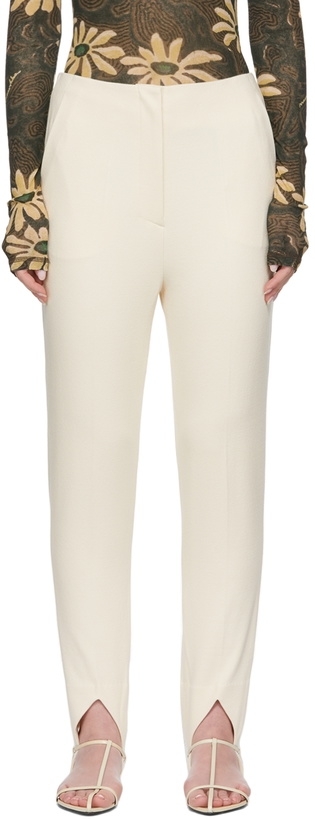 Photo: Nanushka Off-White Darby Stirrup Leggings