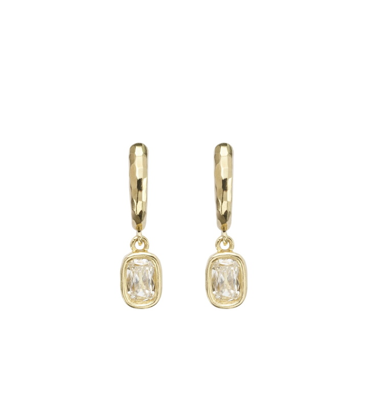 Photo: Octavia Elizabeth Hidden Gem 18kt gold huggies with diamonds
