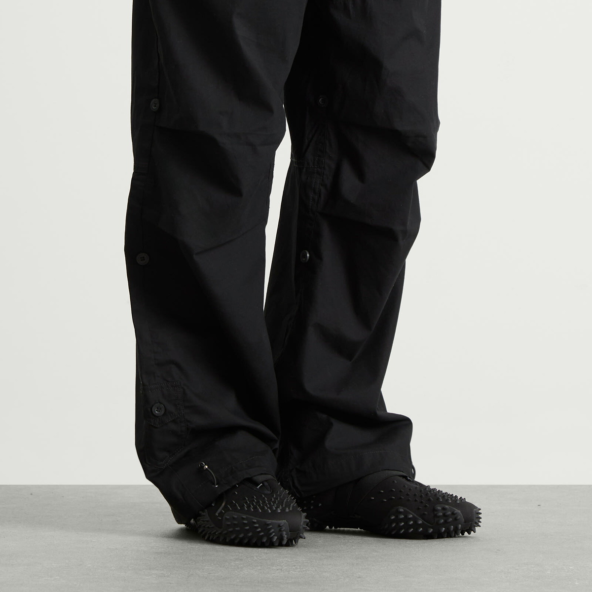 Puma Mostro Spikes Sneaker in Black/Silver