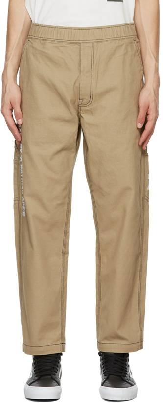 Photo: AAPE by A Bathing Ape Beige Embroidered Logo Chino Trousers