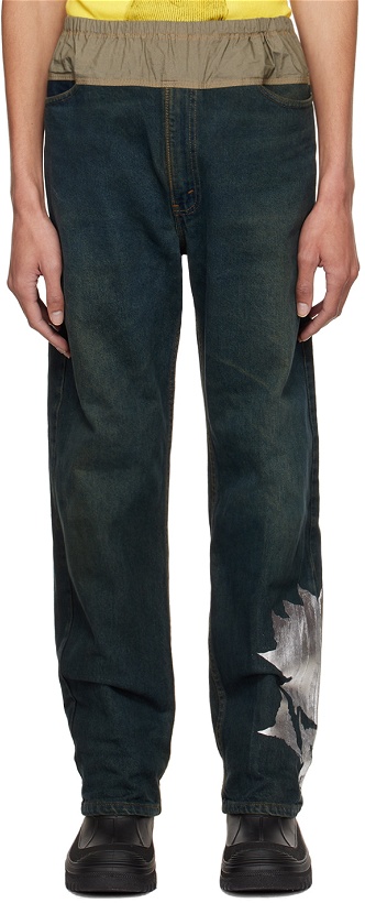 Photo: SC103 SSENSE Exclusive Indigo Graphic Jeans
