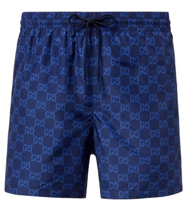Photo: Gucci GG Supreme Web Stripe swim trunks
