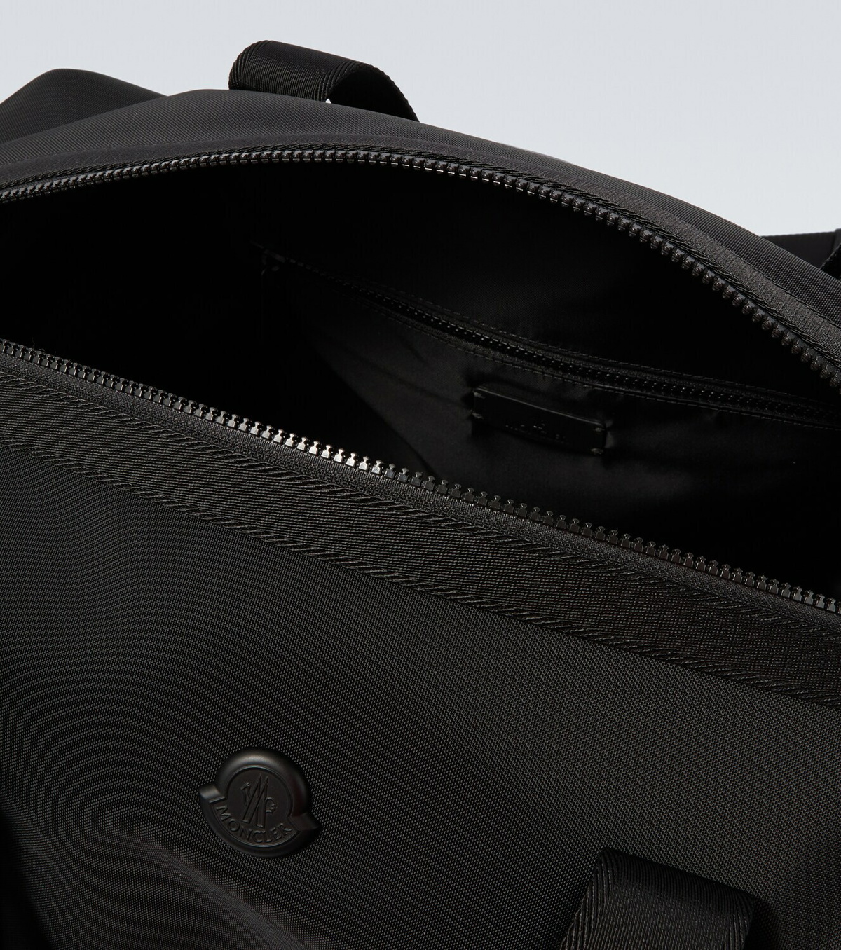 Moncler Leather-trimmed duffel bag