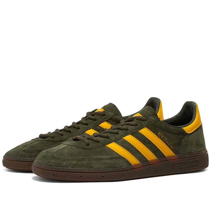 Photo: Adidas Men's Handball Spezial Sneakers in Night Cargo/Yellow/Gum