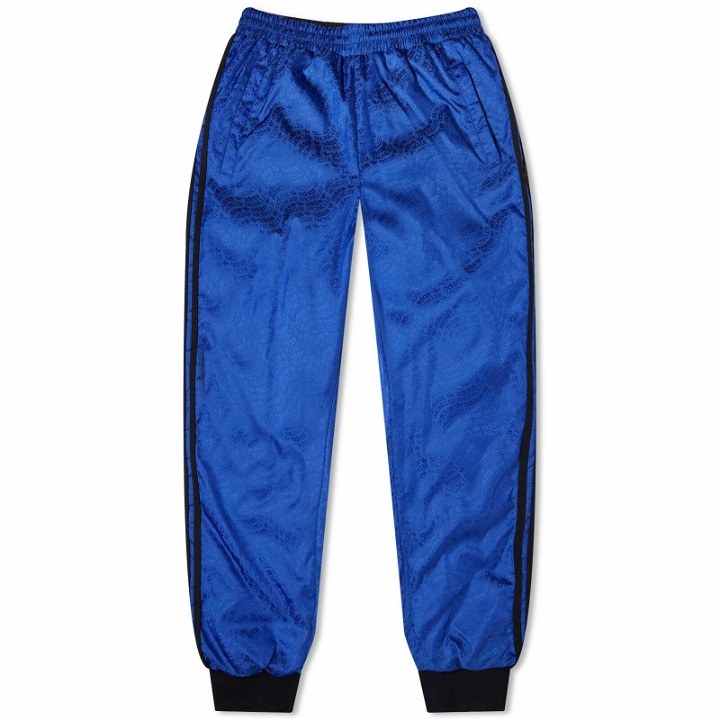 Photo: Moncler Men's x adidas Originals Reversible Down Trousers in Blue