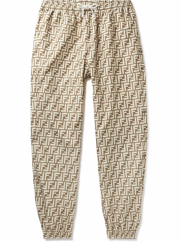 Photo: Fendi - Tapered Logo-Print Shell Drawstring Trousers - Neutrals