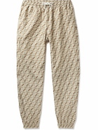 Fendi - Tapered Logo-Print Shell Drawstring Trousers - Neutrals