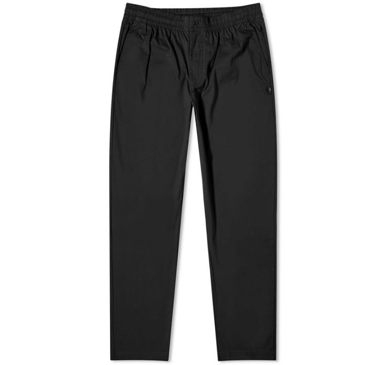 Photo: New Balance Men's Icon Twill Tapered Pant Regular in Black