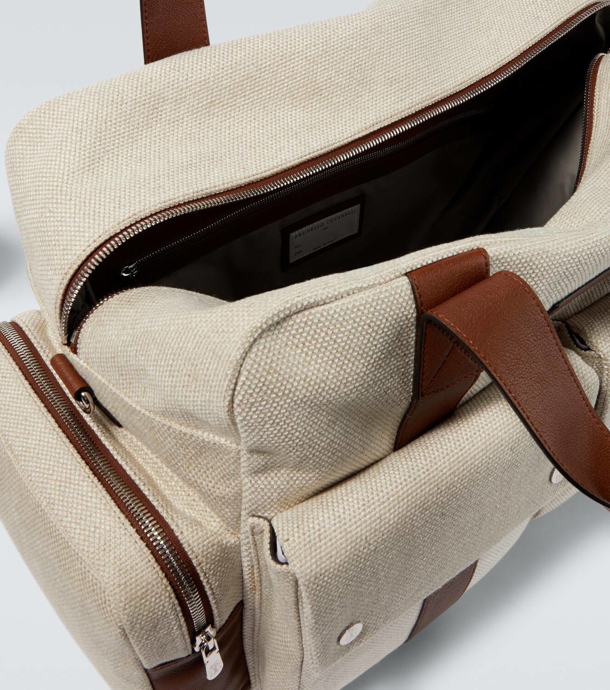 Brunello Cucinelli Leather-trimmed canvas duffel bag