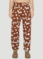 Undercover - Graphic Print Track Pants in Brown