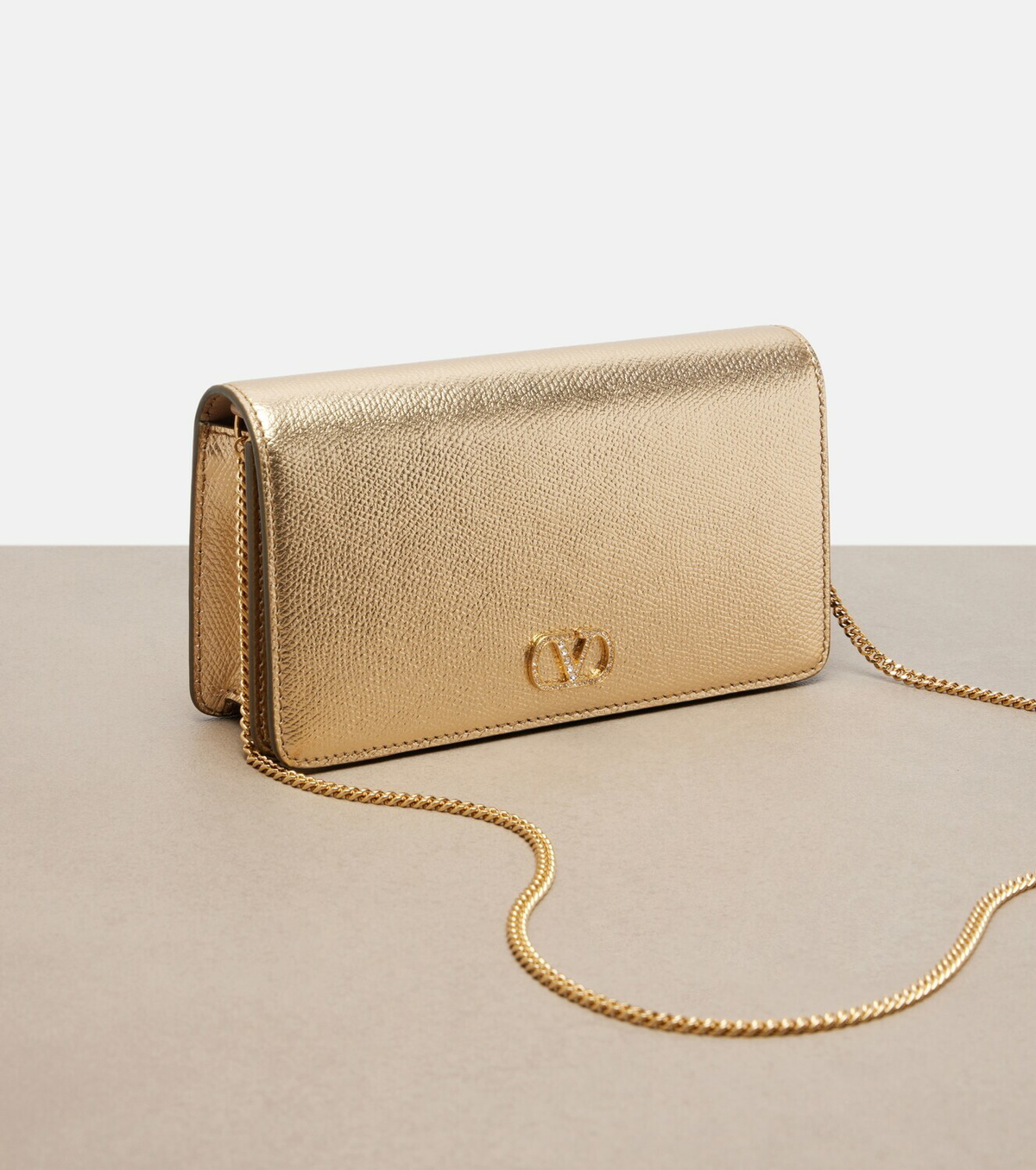 Valentino Garavani VLogo Mini metallic leather clutch