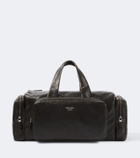 Prada Distressed leather duffel bag