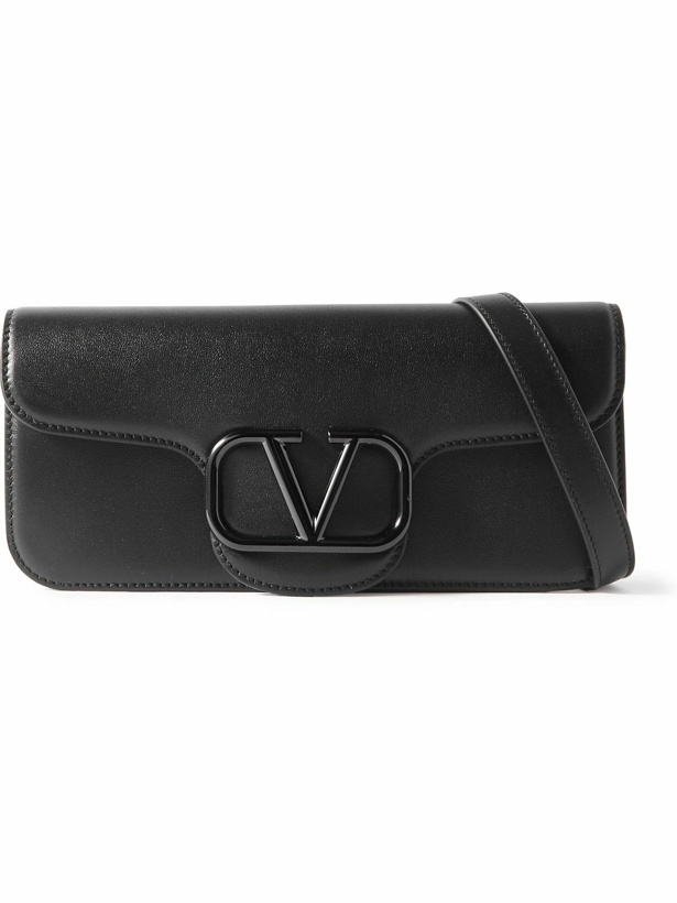 Photo: Valentino Garavani - Logo-Appliquéd Leather Messenger Bag