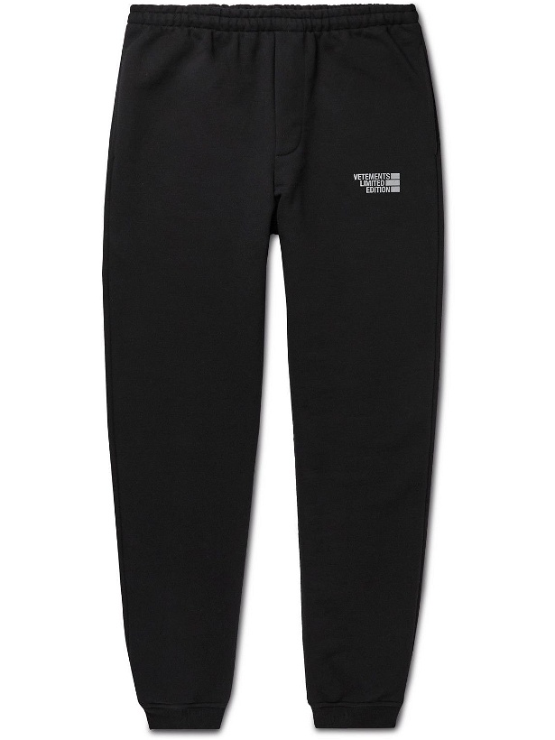 Photo: VETEMENTS - Tapered Logo-Print Cotton-Blend Jersey Sweatpants - Black