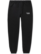 VETEMENTS - Tapered Logo-Print Cotton-Blend Jersey Sweatpants - Black