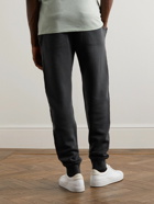 TOM FORD - Tapered Garment-Dyed Cotton-Jersey Sweatpants - Black